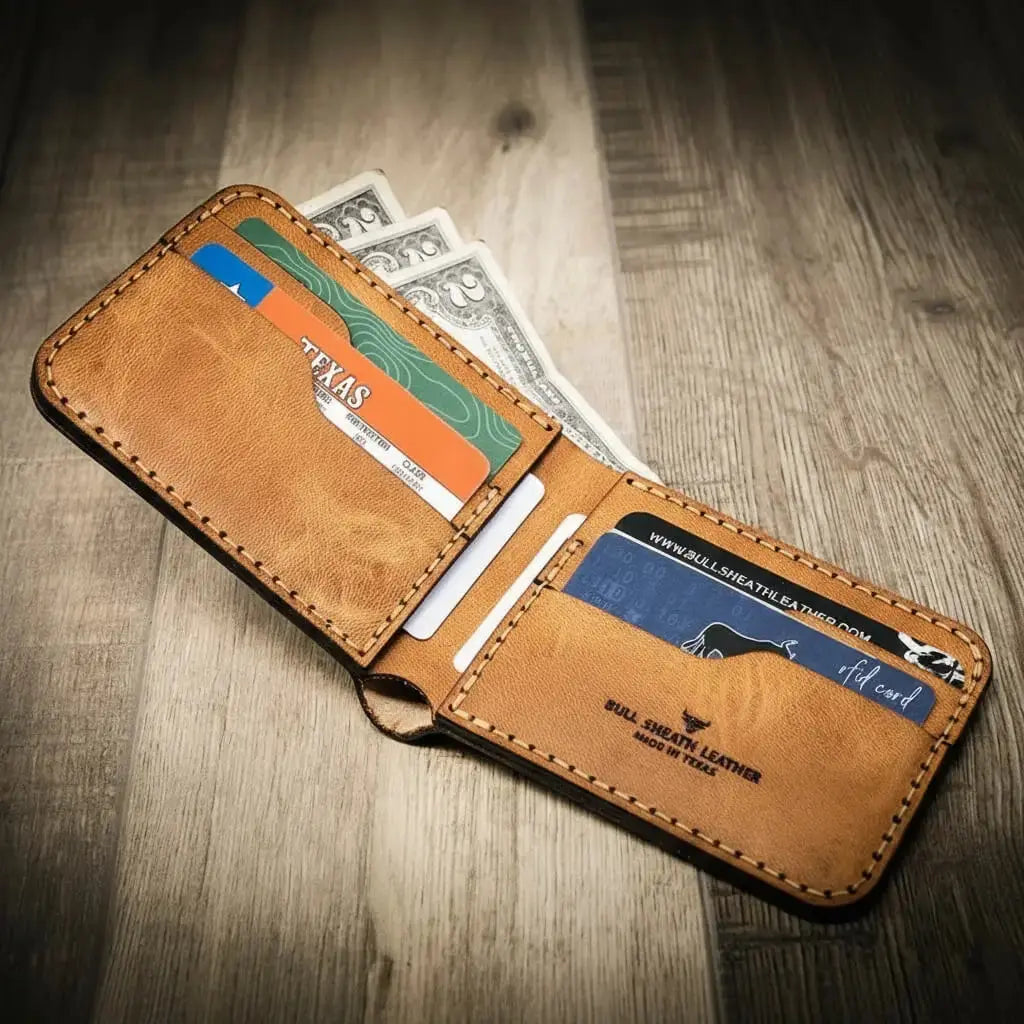 Tan full-grain leather bifold wallet with multiple card slots by Bull Sheath Leather.