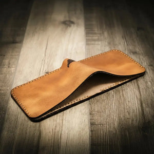 Brown leather bifold wallet with stitching detail