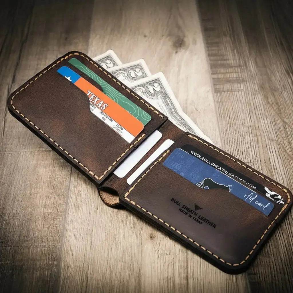 Brown leather bifold wallet with Texas ID, dollar bills, and credit cards