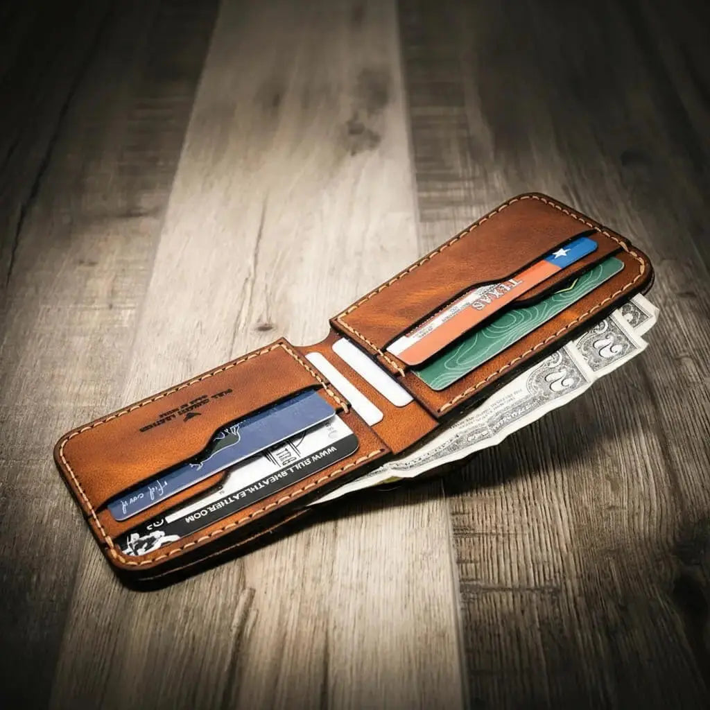 Brown leather bifold wallet with Texas card and money