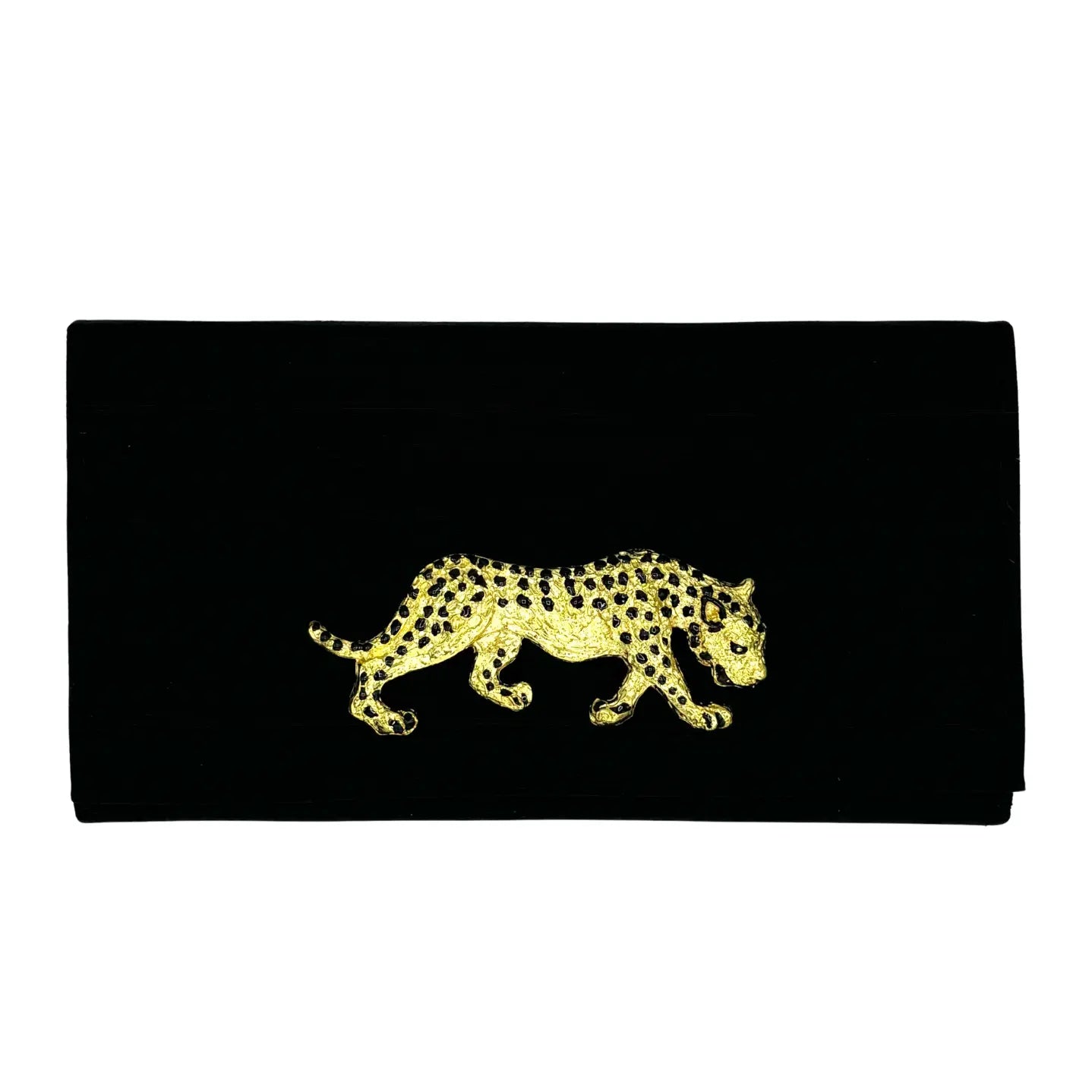 Black clutch with gold leopard design and black spots.
