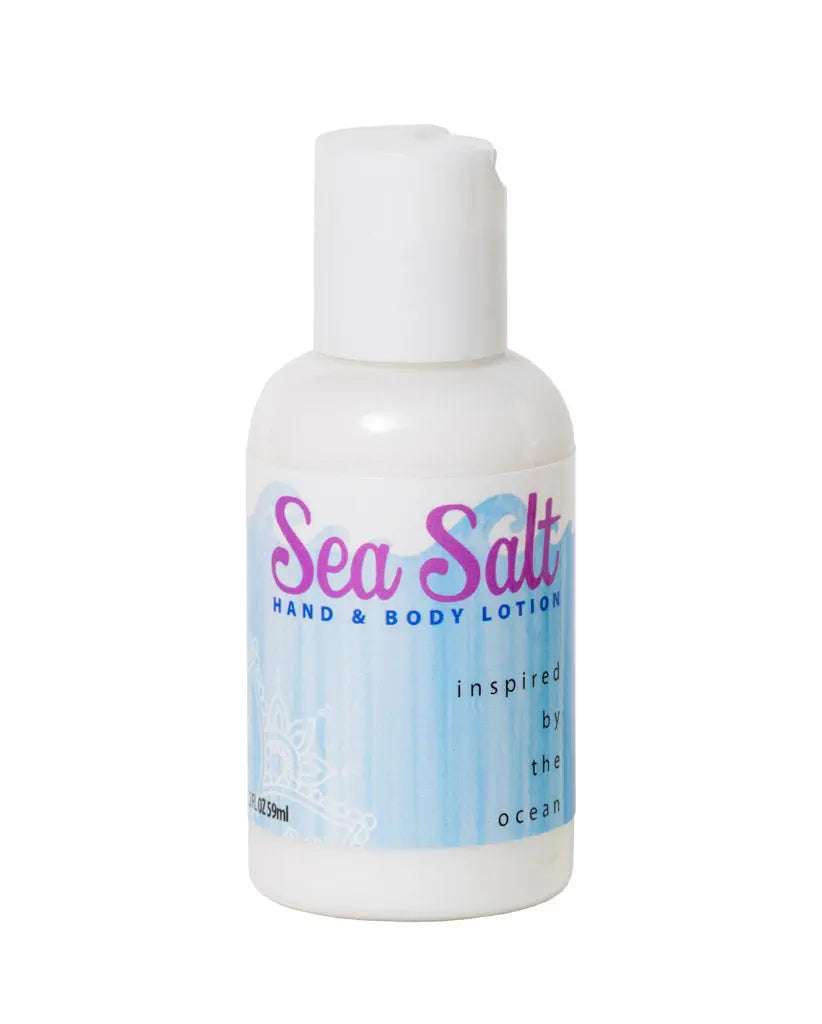 Sea Salt Hand & Body Lotion in a white bottle with ocean-inspired design, 2 oz