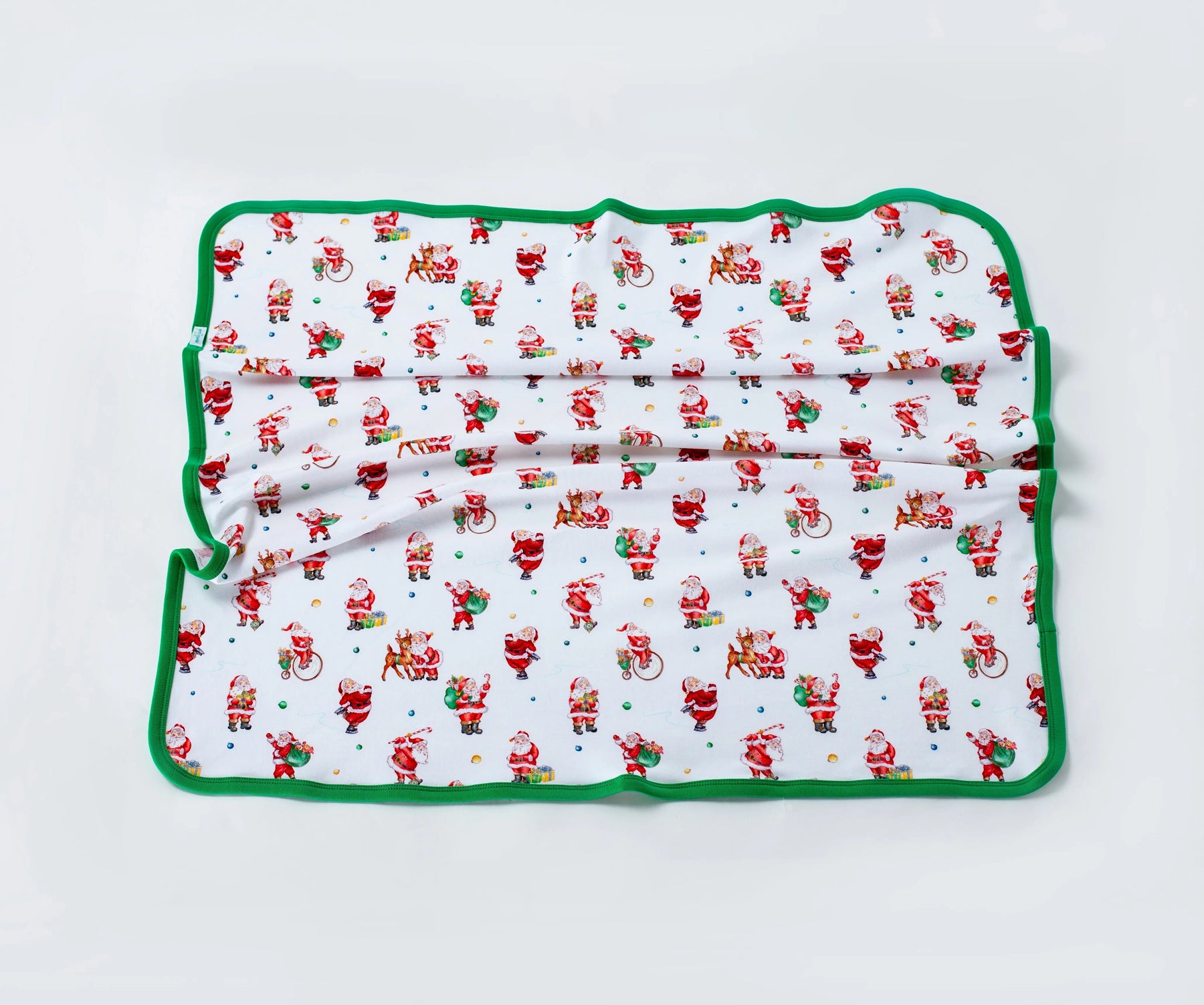 Santa Claus is Coming to Town Organic Cotton Christmas Baby Blanket by Nola Tawk, children's boutique clothing main product photo