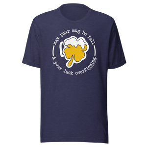 Navy blue t-shirt with a shamrock beer mug graphic and the text "May your mug be full & your luck overflowing."