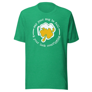 Green t-shirt with shamrock beer mug graphic and text: \"May your mug be full & your luck overflowing.\"