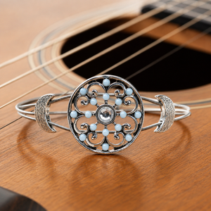 Light blue and silver guitar string bracelet by N Harmony Jewelry