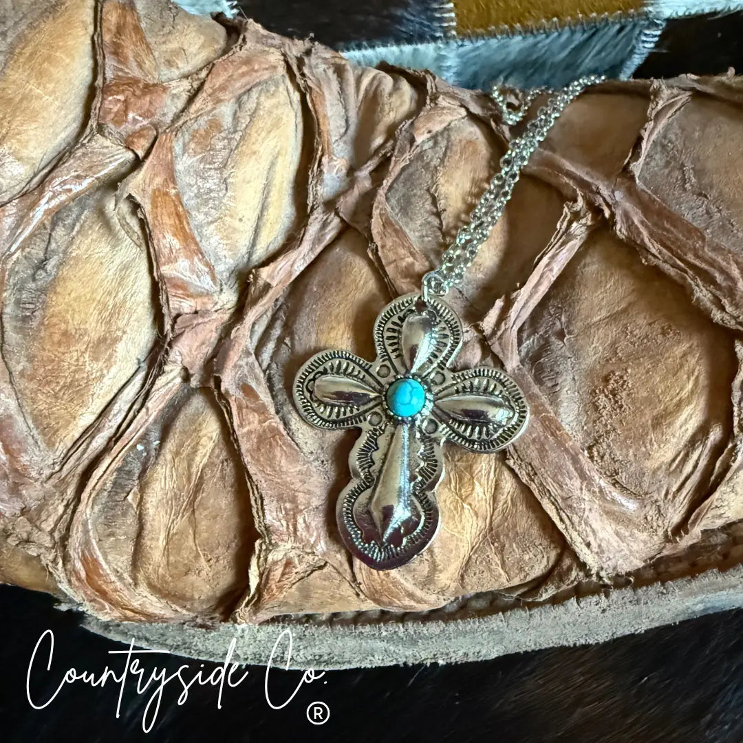 Silver Southwestern cross necklace with faux turquoise stone