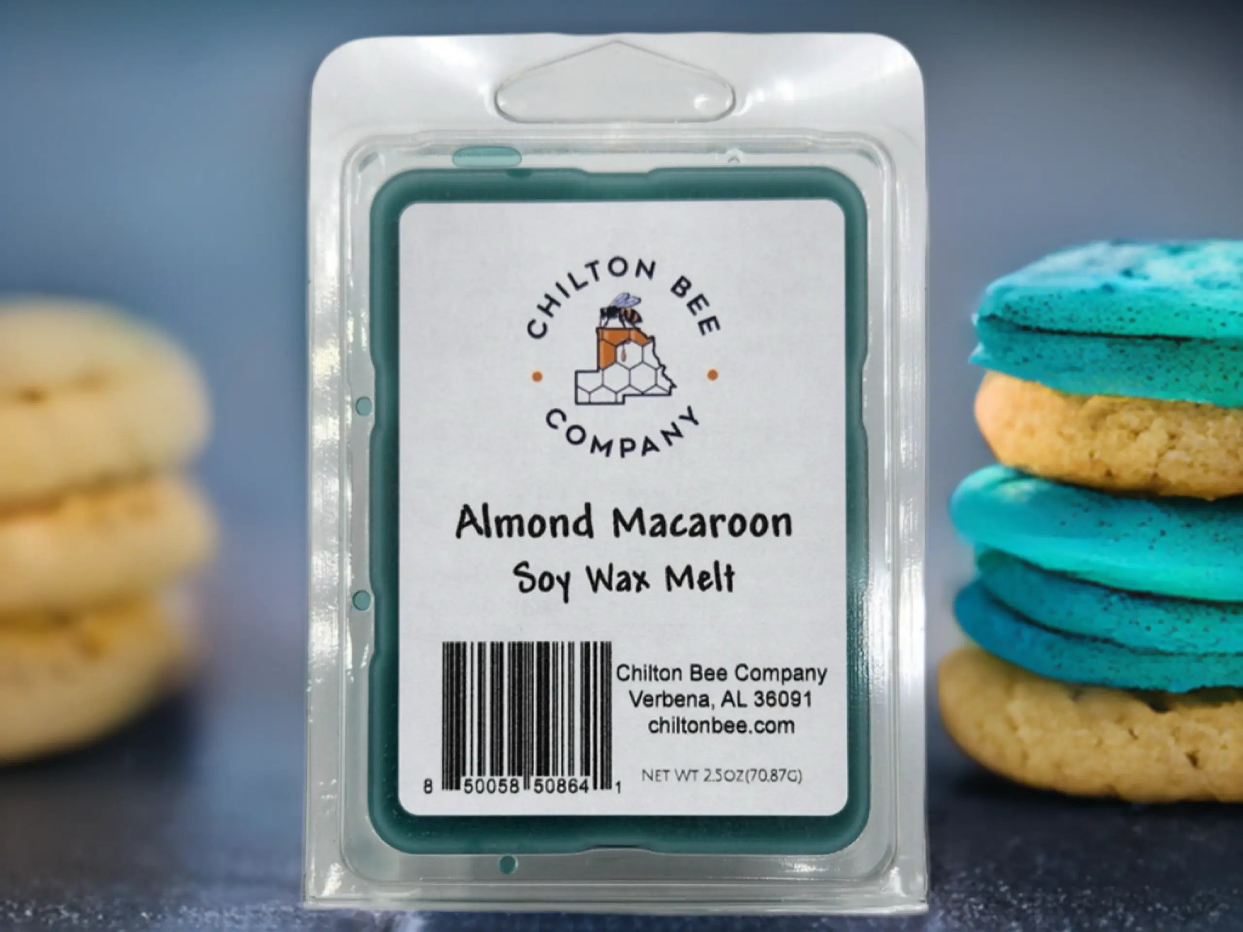 Chilton Bee Company Almond Macaroon soy wax melt in packaging with macarons in background.