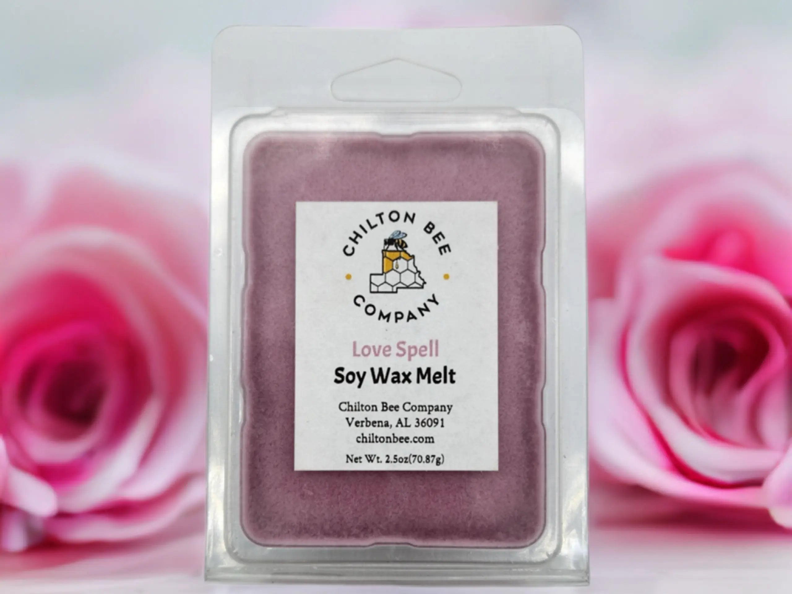 Chilton Bee Company Love Spell Soy Wax Melt in clear packaging with roses background.