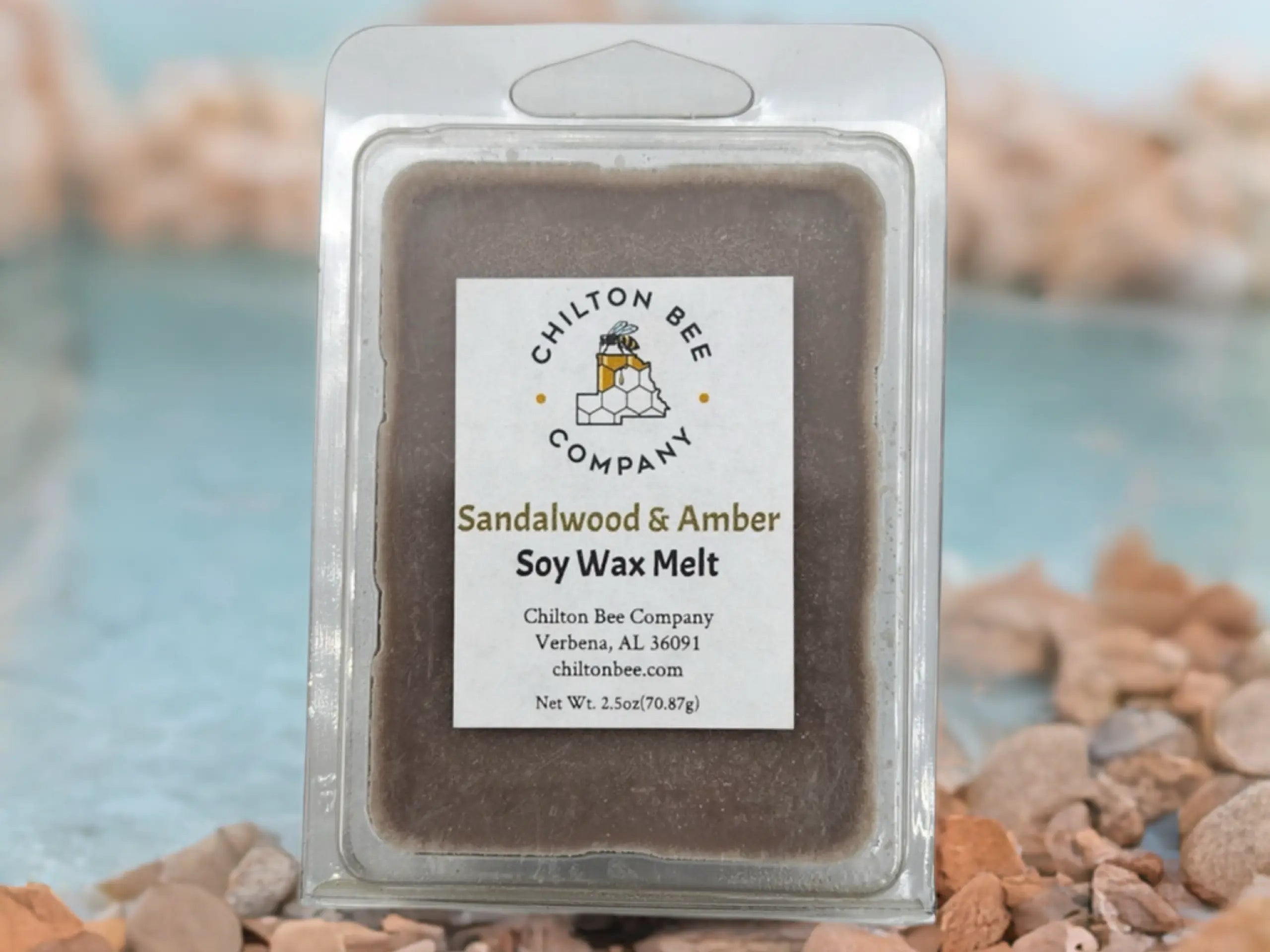 Chilton Bee Company Sandalwood & Amber Soy Wax Melt in a clear plastic container with a white product label.