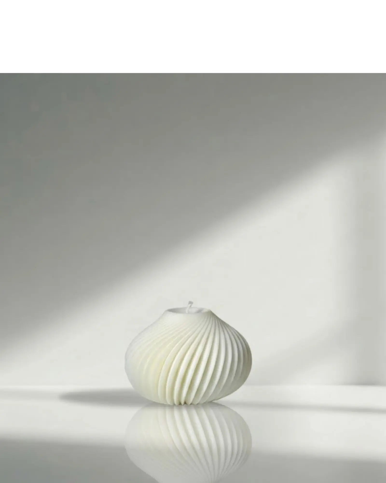 Spiral sculptural candle by Believe Candle