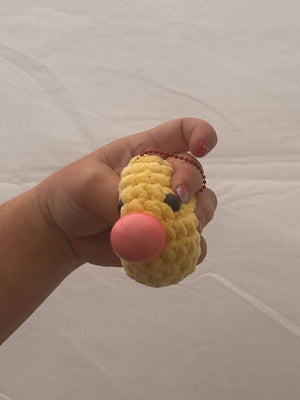 Hand Holding Crochet Stress Blob from Main Street Collective - Squeezable Yellow Stress Ball Toy for Anxiety Relief