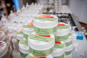 The Orchard Hand Cream jars with Grapefruit & Calendula scent by Essential Journeys.