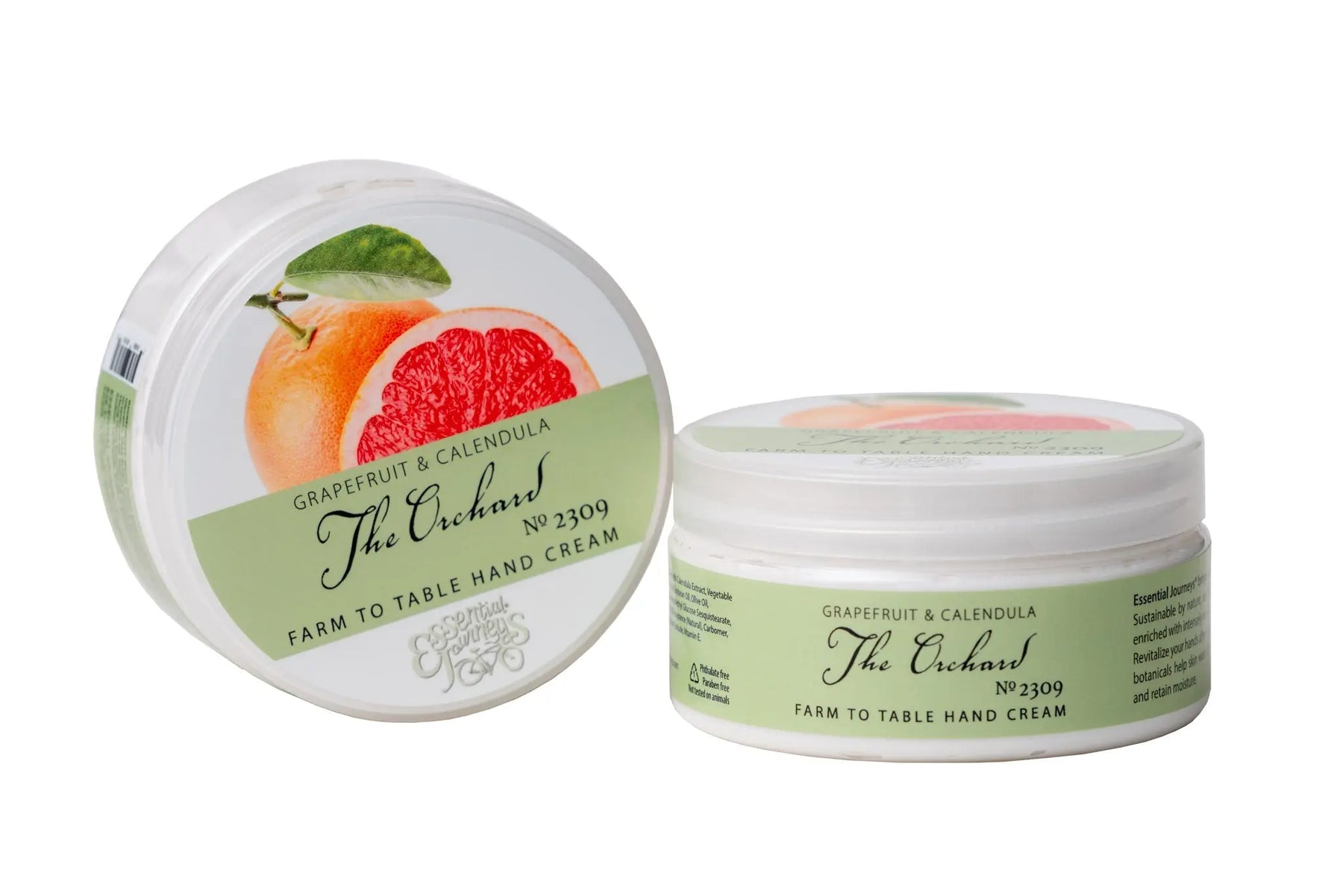 Two jars of The Orchard Grapefruit & Calendula Farm to Table Hand Cream with grapefruit imagery.