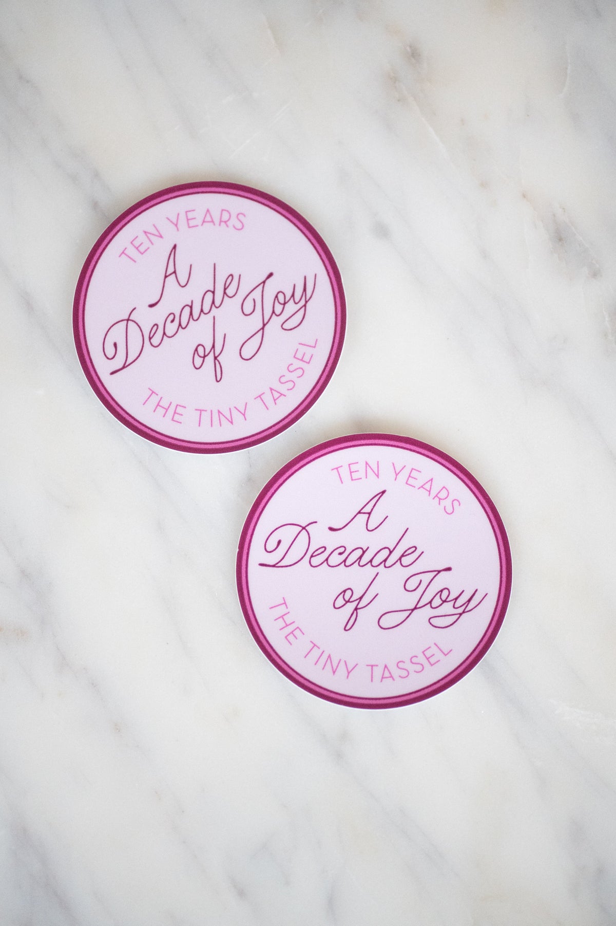 A Decade of Joy Sticker by The Tiny Tassel