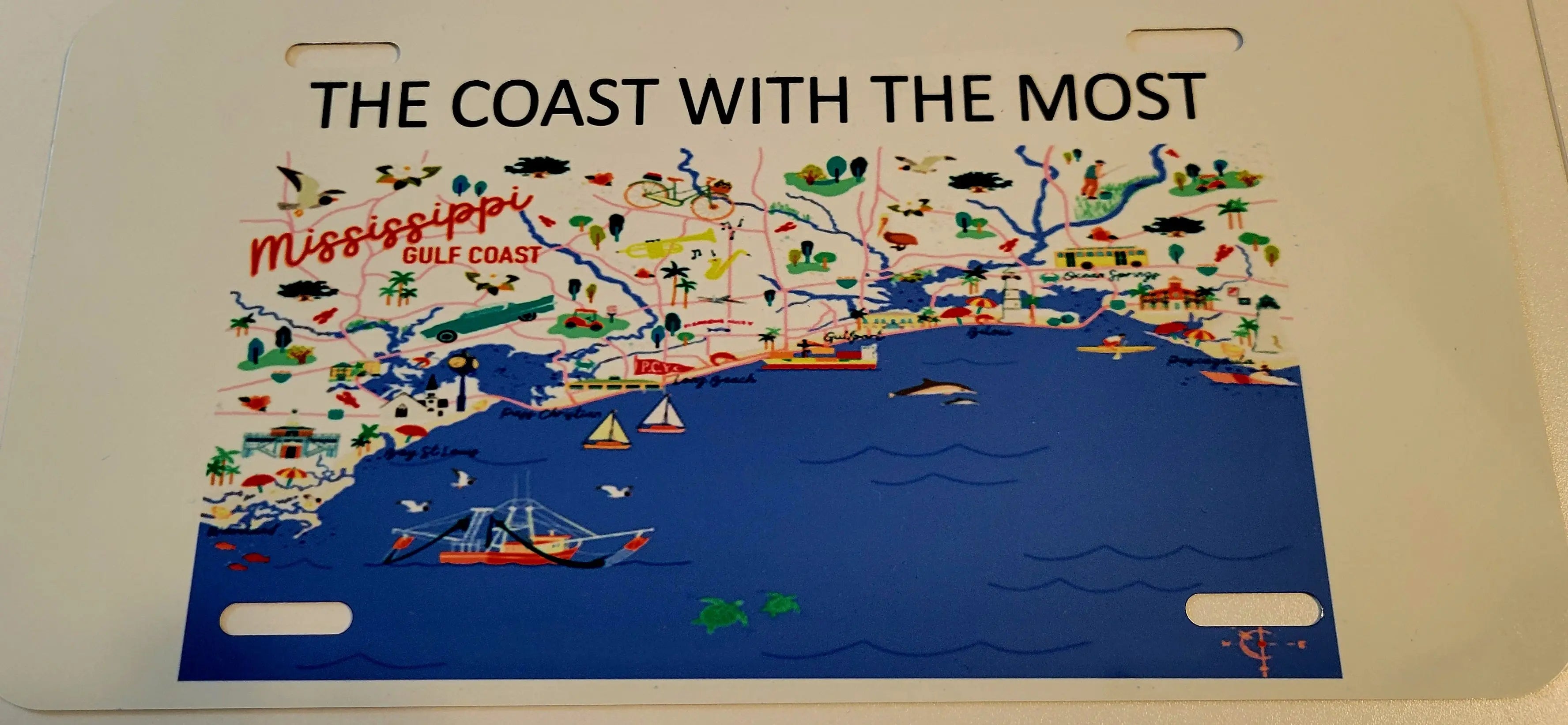 The Coast With The Most-Mississippi Coast Front License Plate by Two Beachin' Sisters, Southern home decor main product photo