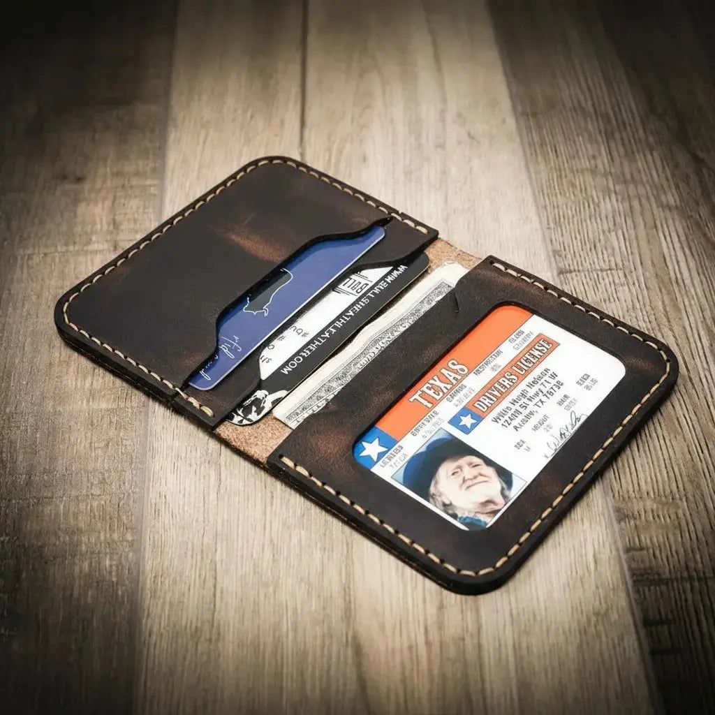 Brown leather bifold wallet with Texas driver's license and cards inside.