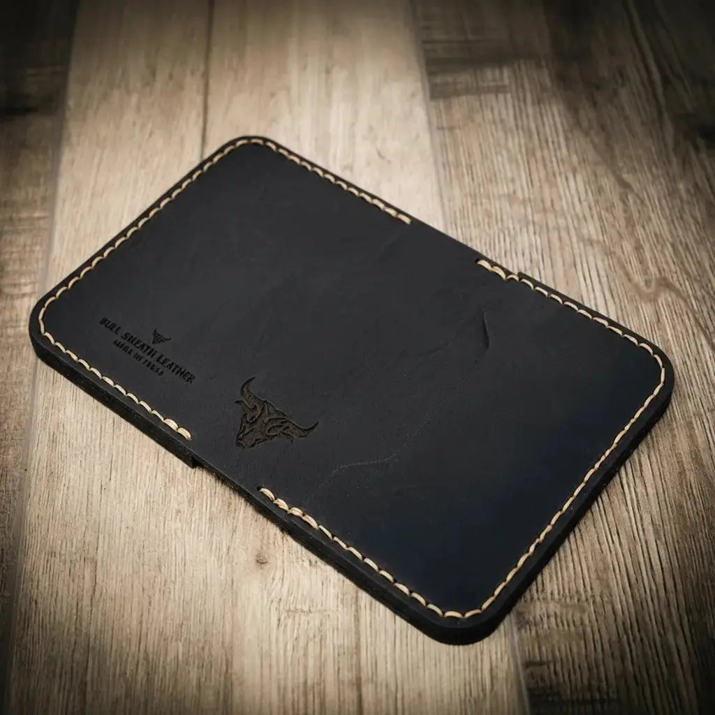 The Georgetown black leather bifold wallet with stitched edges and bull logo.