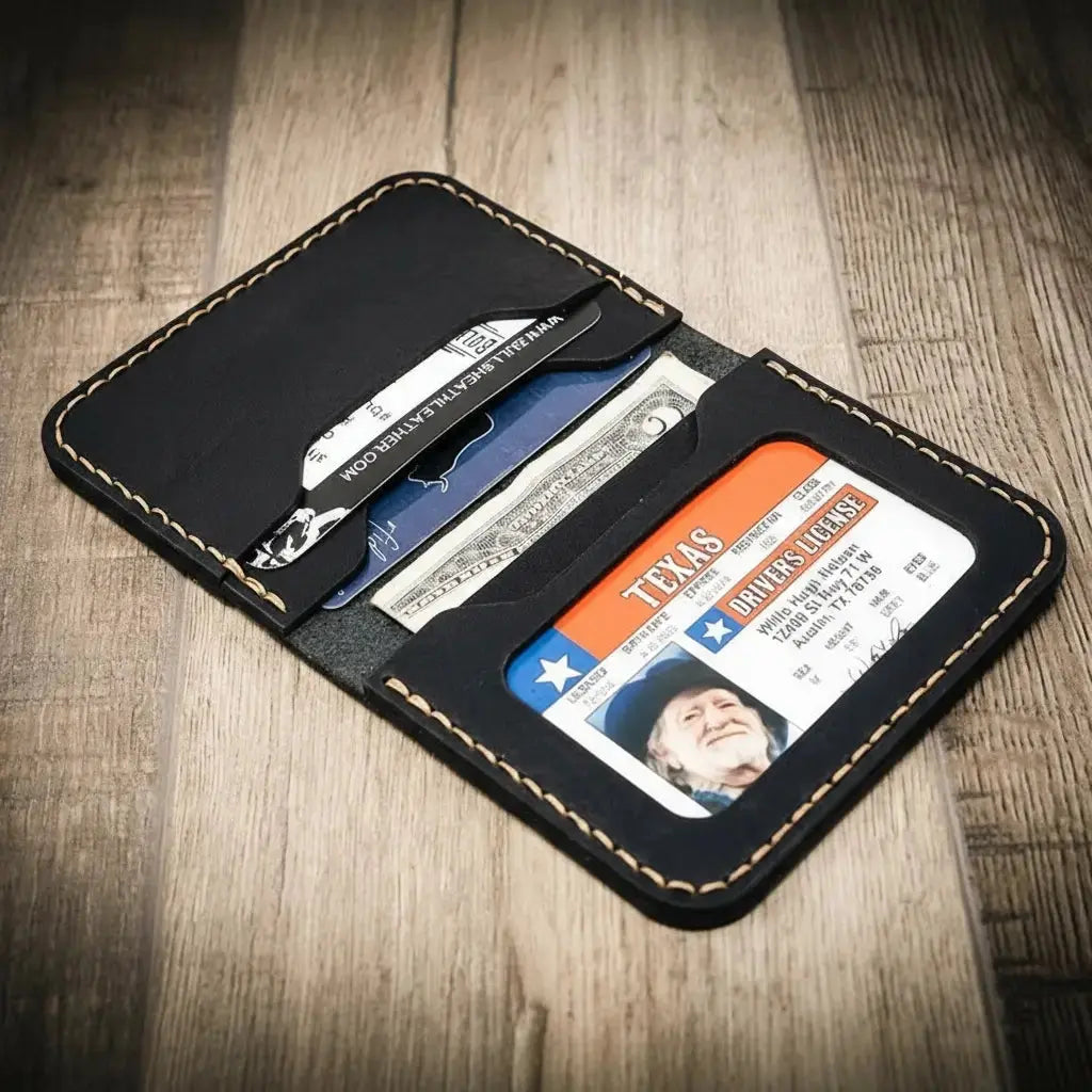 Black leather bifold wallet holding Texas driver's license, cards, and US currency.