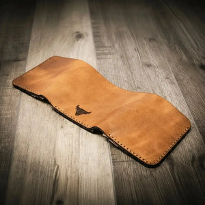 Trinity Trifold Wallet front exterior with natural leather character
