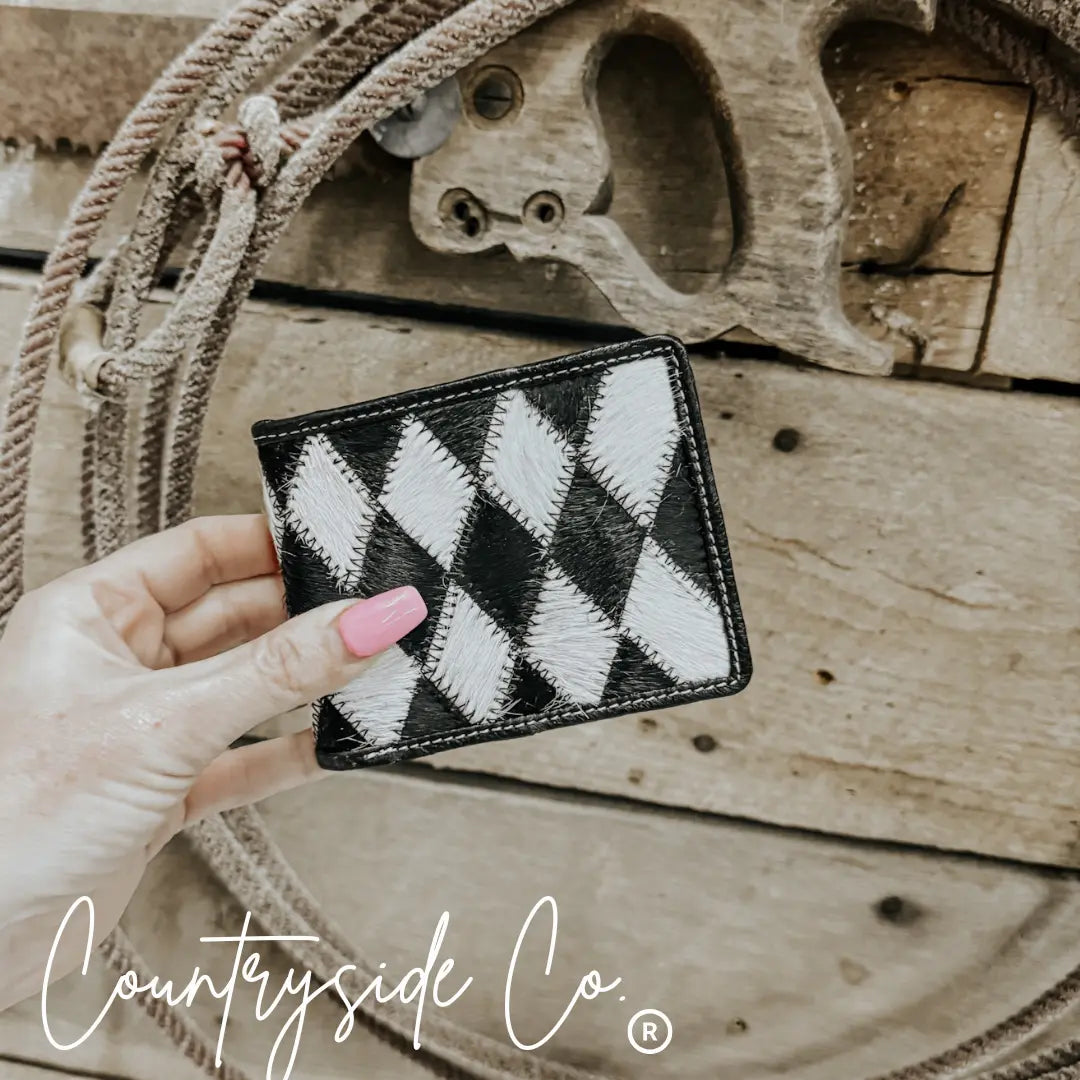 Men's wallet with a black and white diamond cowhide pattern.