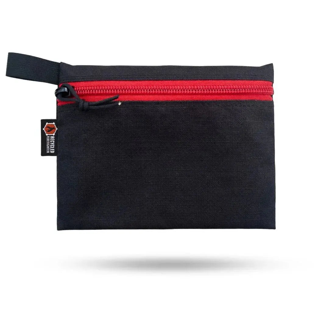 Black flat zippered pouch with red zipper and "Recycled Firefighter" tag.