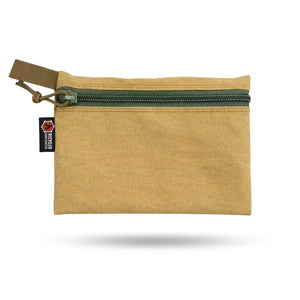 Tan flat zippered pouch with green zipper and "Recycled Firefighter" tag.