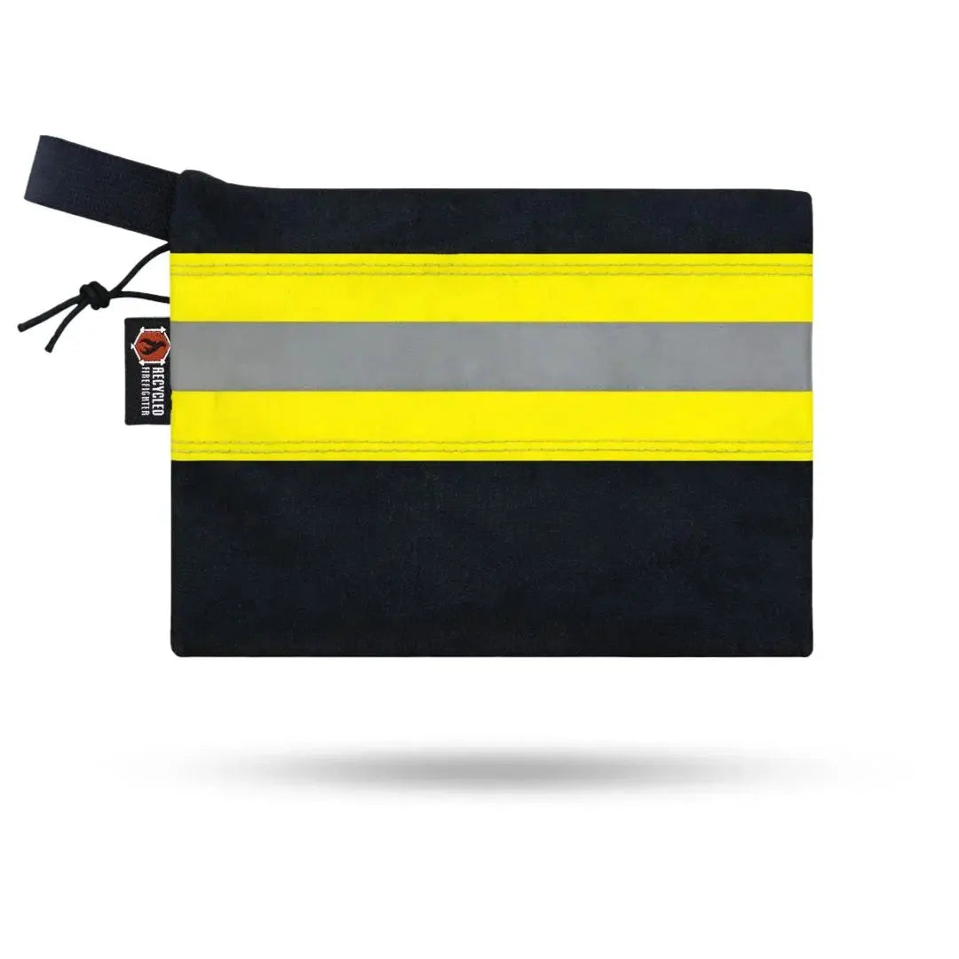 Black zippered gear pouch with two yellow and one gray reflective stripe.