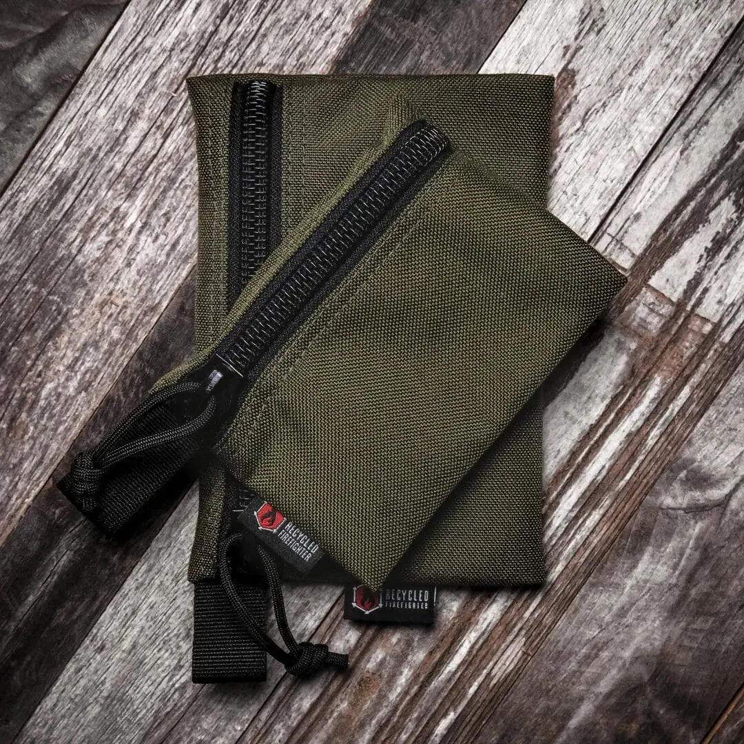 Two olive green zippered pouches, one larger than the other, with Recycled Firefighter logos.