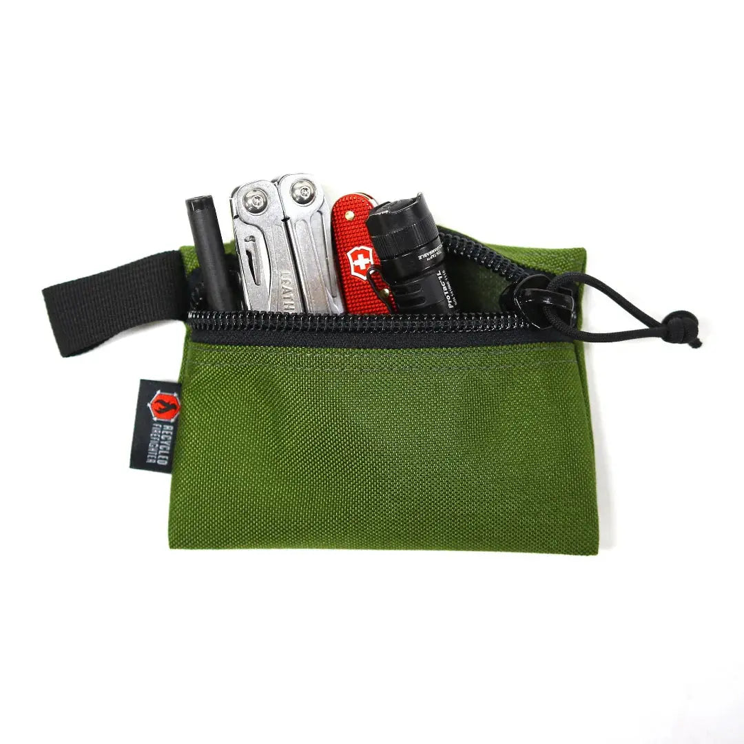 Green zippered pouch holding a multi-tool, Swiss Army knife, and flashlight.