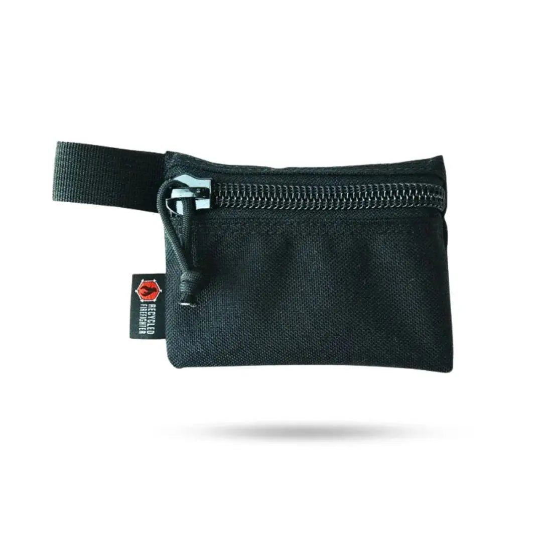 Black small zippered gear pouch with red "Recycled Firefighter" tag.