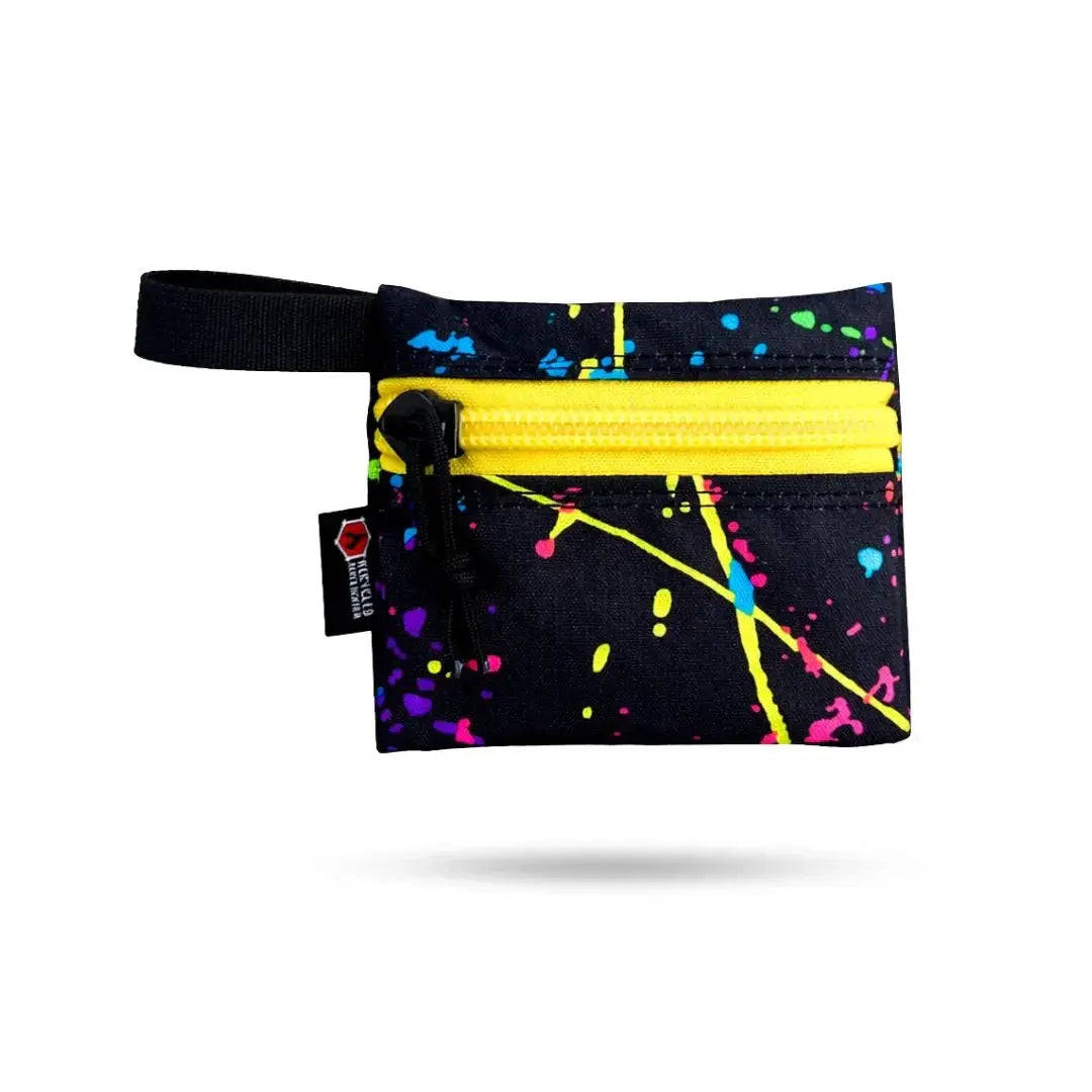 Truckie - Small black gear pouch with yellow zipper and colorful paint splatter design.