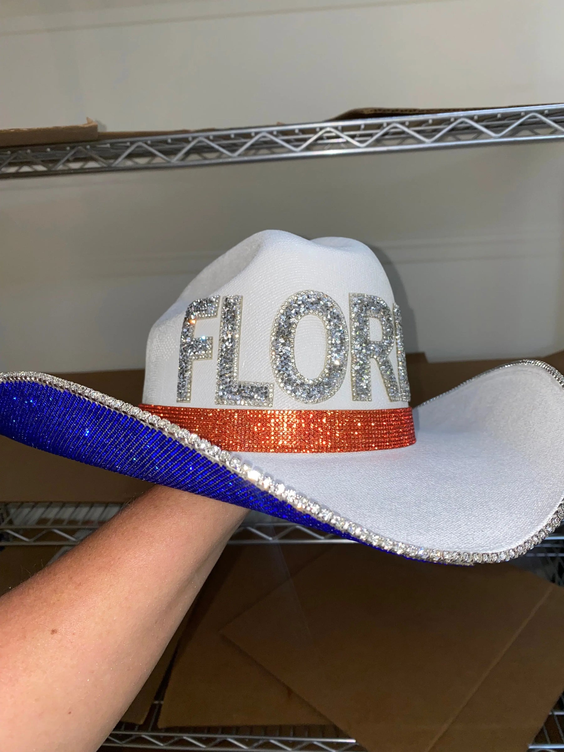 White University of Florida cowboy hat with rhinestones and "FLORIDA" text.