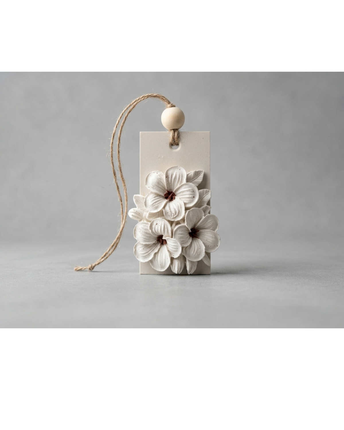 Floral hanging diffuser stone with jute cord by Believe Candle – product view 1