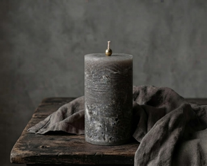Gray textured pillar candles by Believe Candle in multiple heights