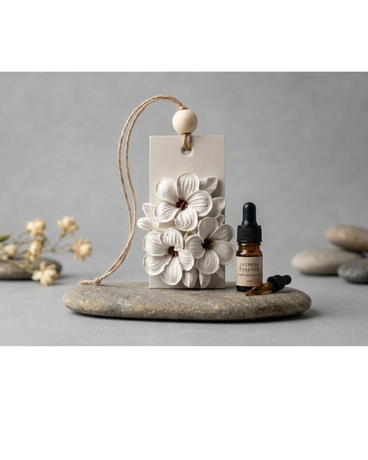 Floral hanging diffuser stone with jute cord by Believe Candle – product view 3