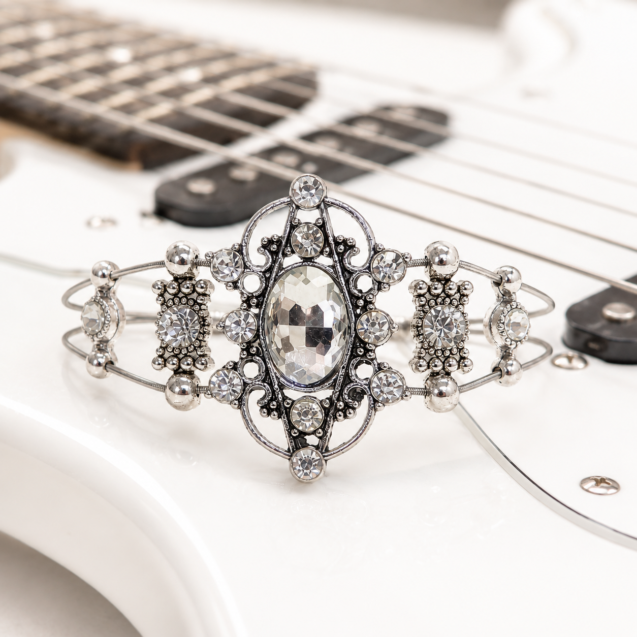Five slider silver rhinestone guitar string bracelet
