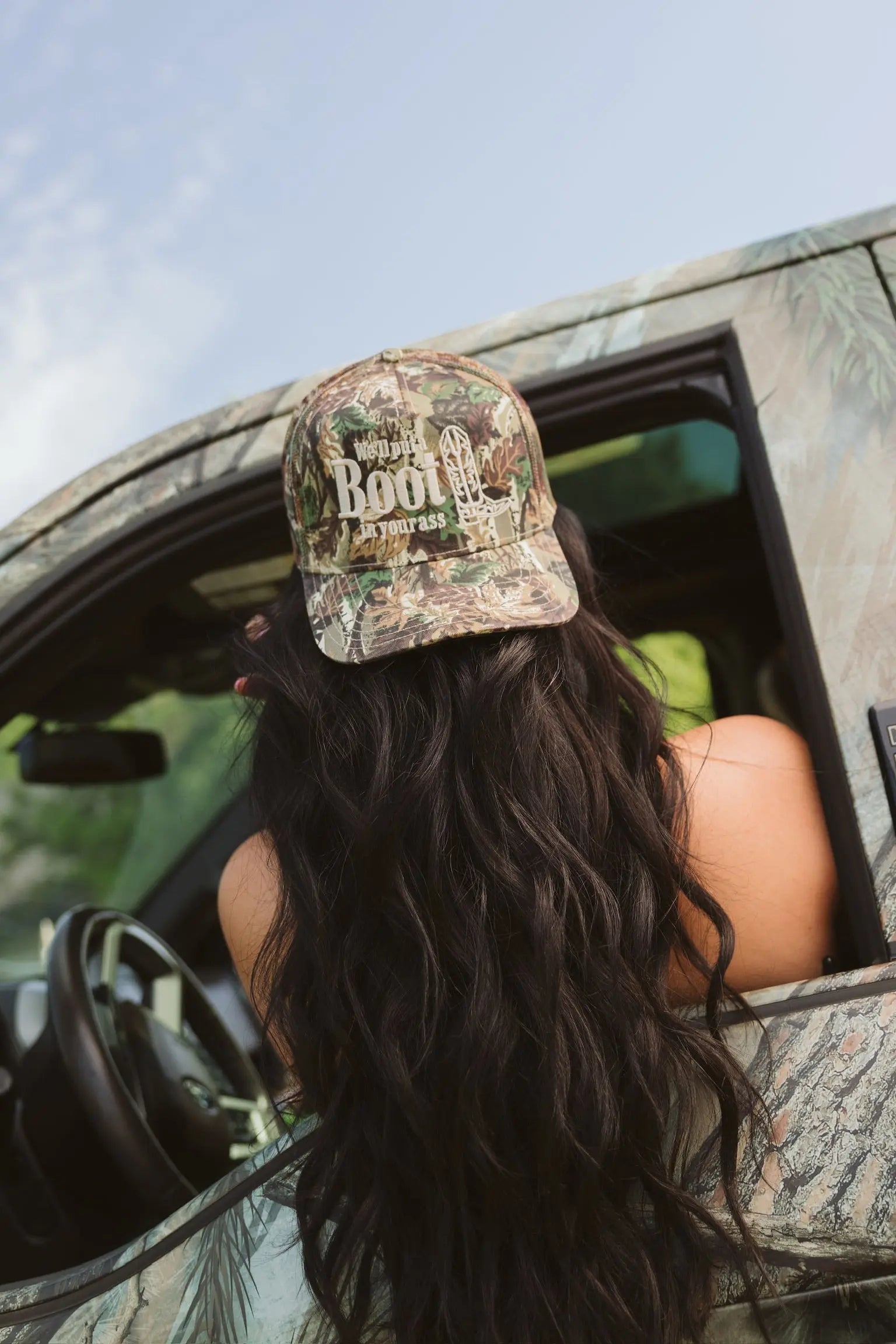 We'll Put A Boot in your Ass - Camo Trucker Hat by KenzKustomz, Southern lifestyle apparel main product photo