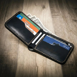 Black leather bifold wallet with Texas driver's license and cash inside.