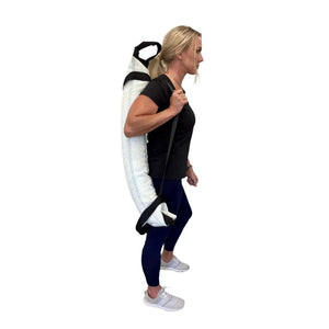 Woman carrying a white and black workout battle bag over her shoulder