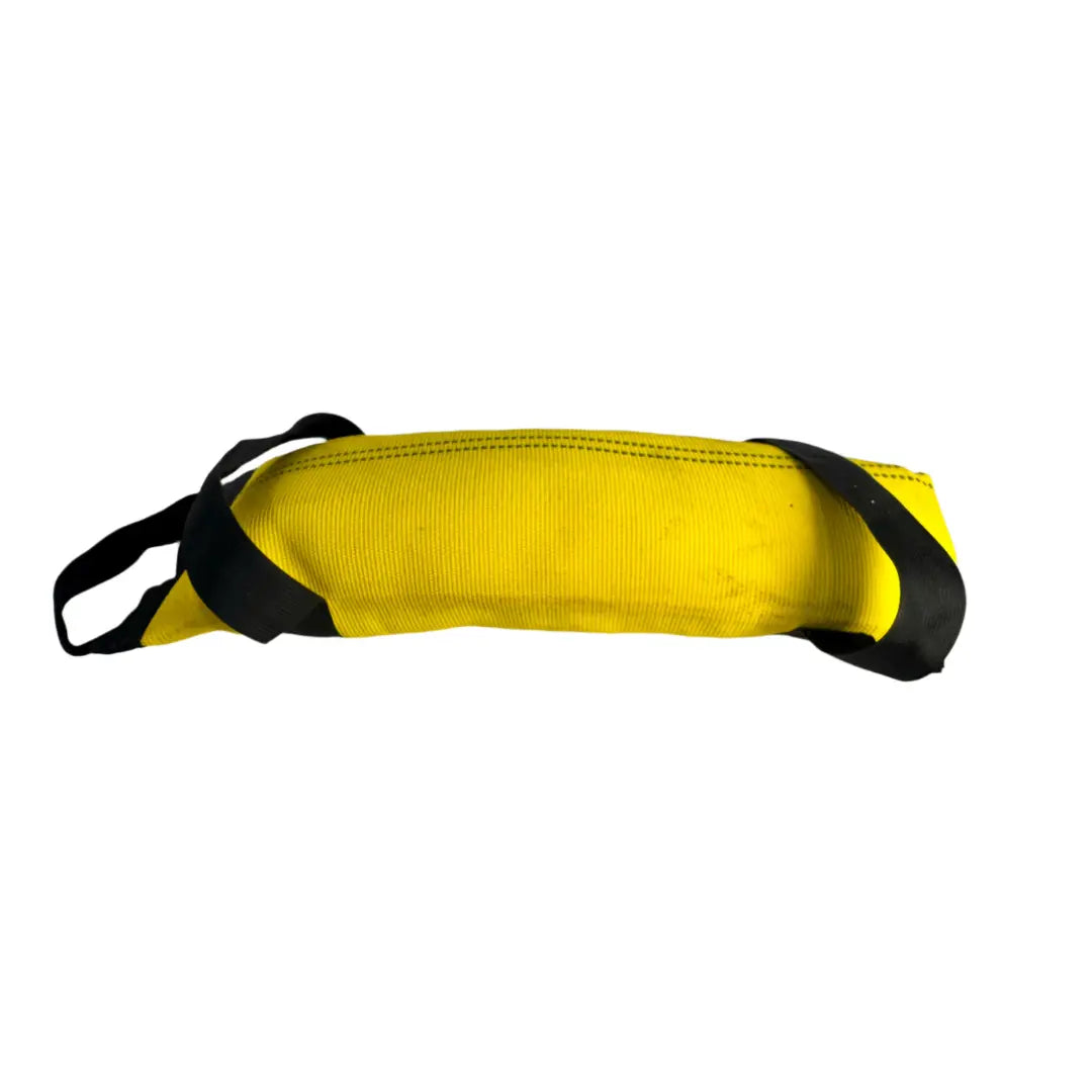 Yellow workout bag with black handles and stitching, isolated on white.