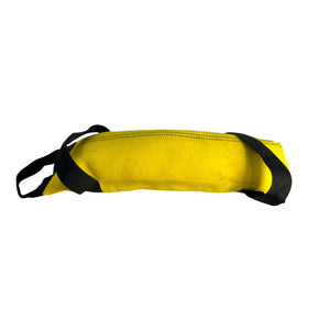 Yellow workout bag with black handles and stitching, isolated on white.
