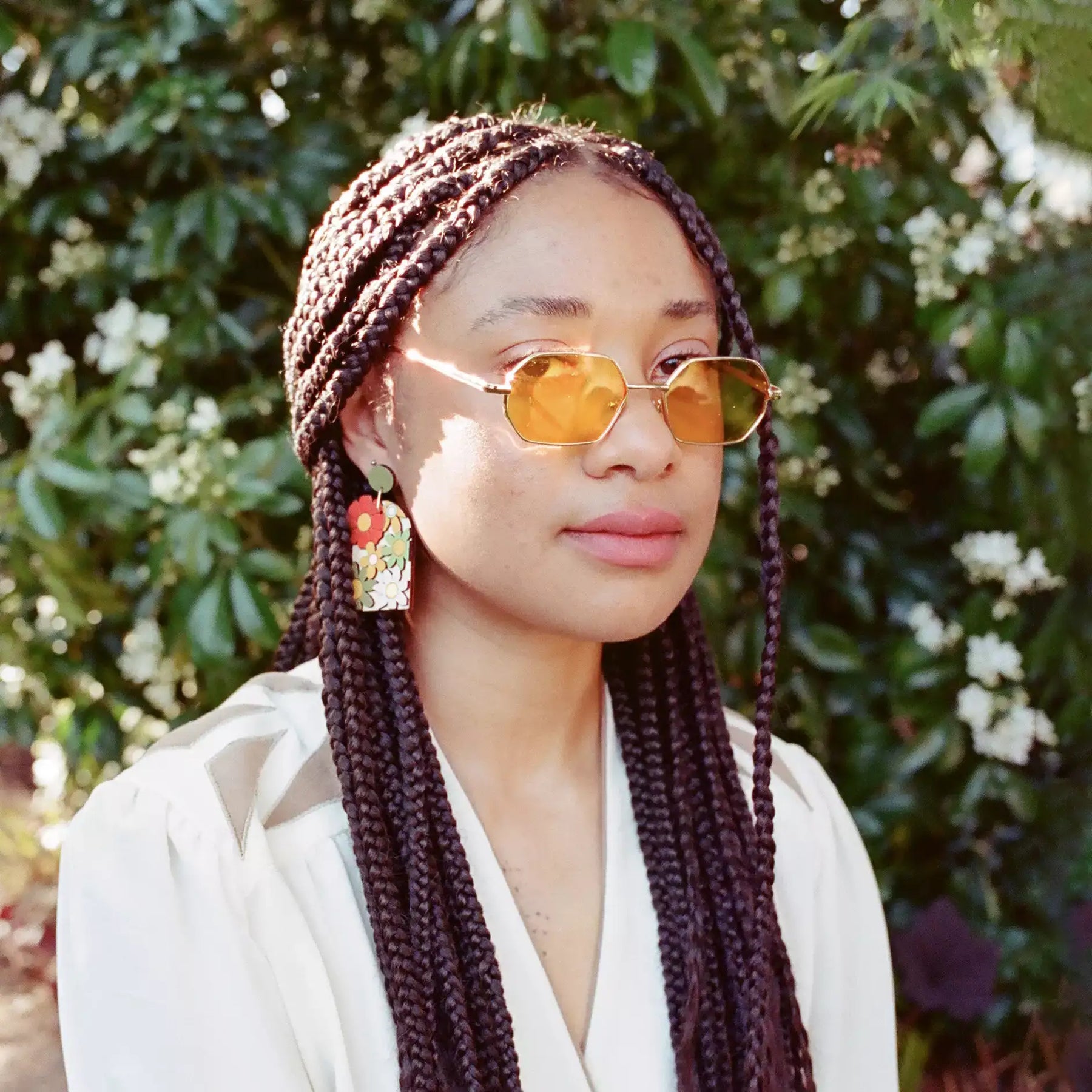 Additional view of 70s Burnt Orange Floral Arch Earrings hand painted on lightweight wood by LE CHIC MIAMI
