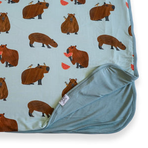 Additional view of Capybara reversible bamboo blanket with hand drawn animal print