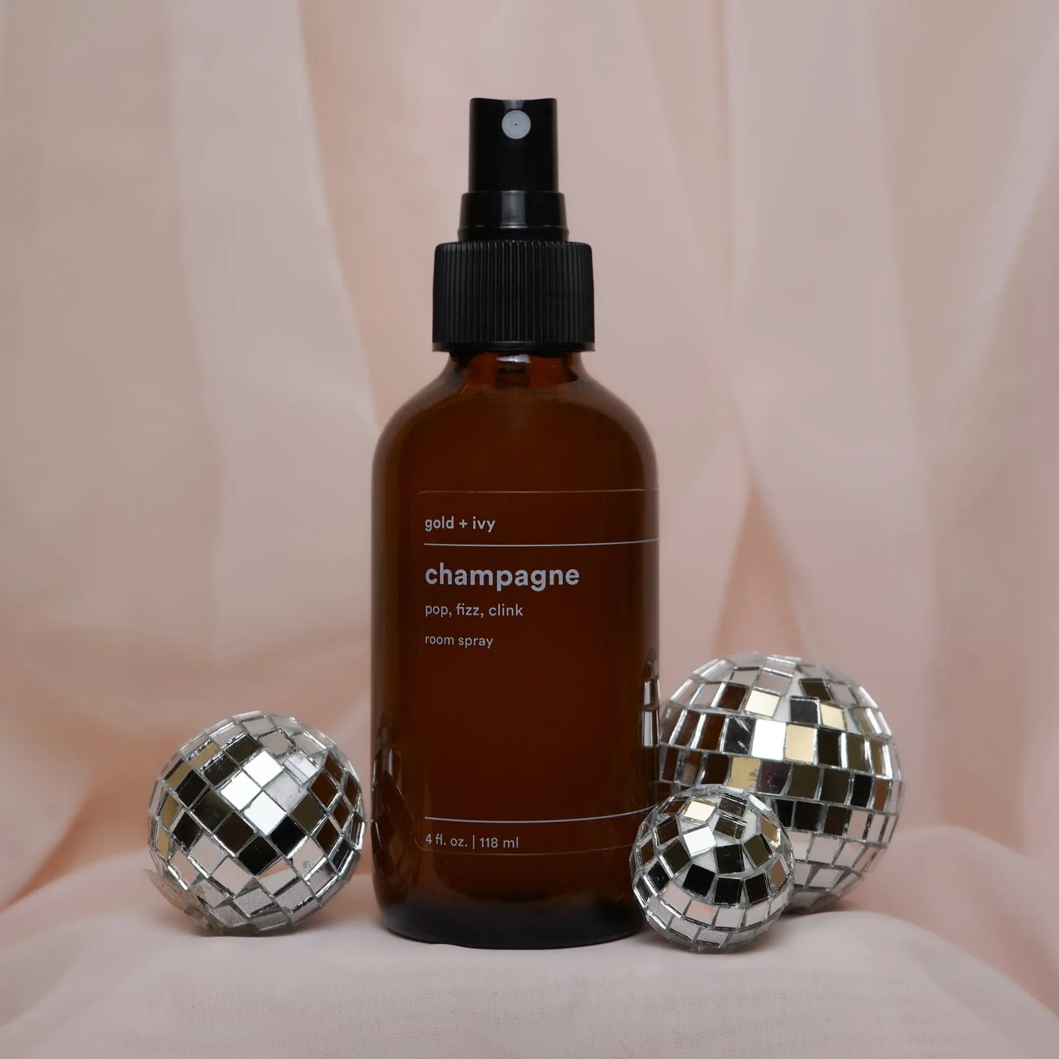 Champagne room spray by gold + ivy, scented candle main product photo