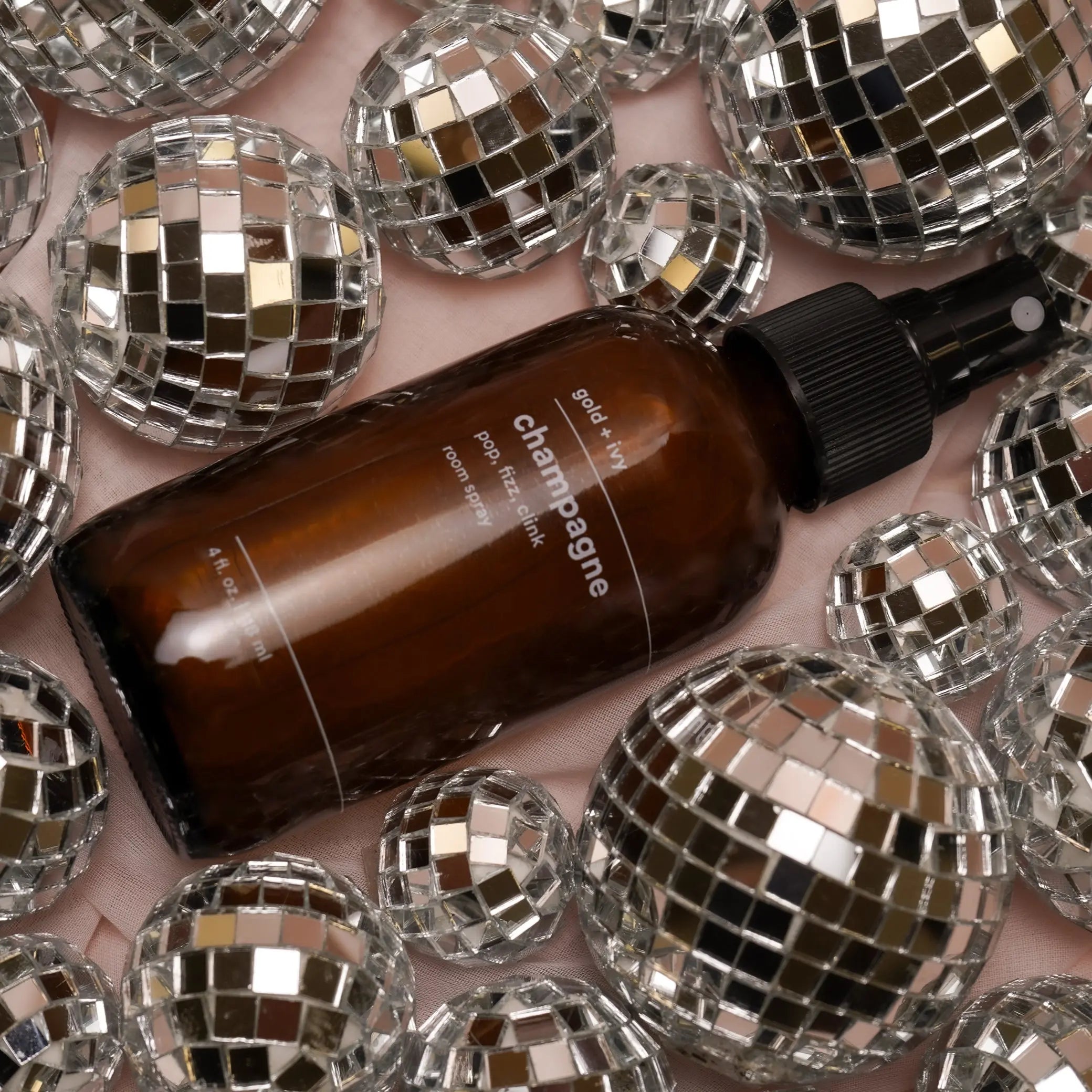 Champagne room spray by gold + ivy, scented candle detail photo 2