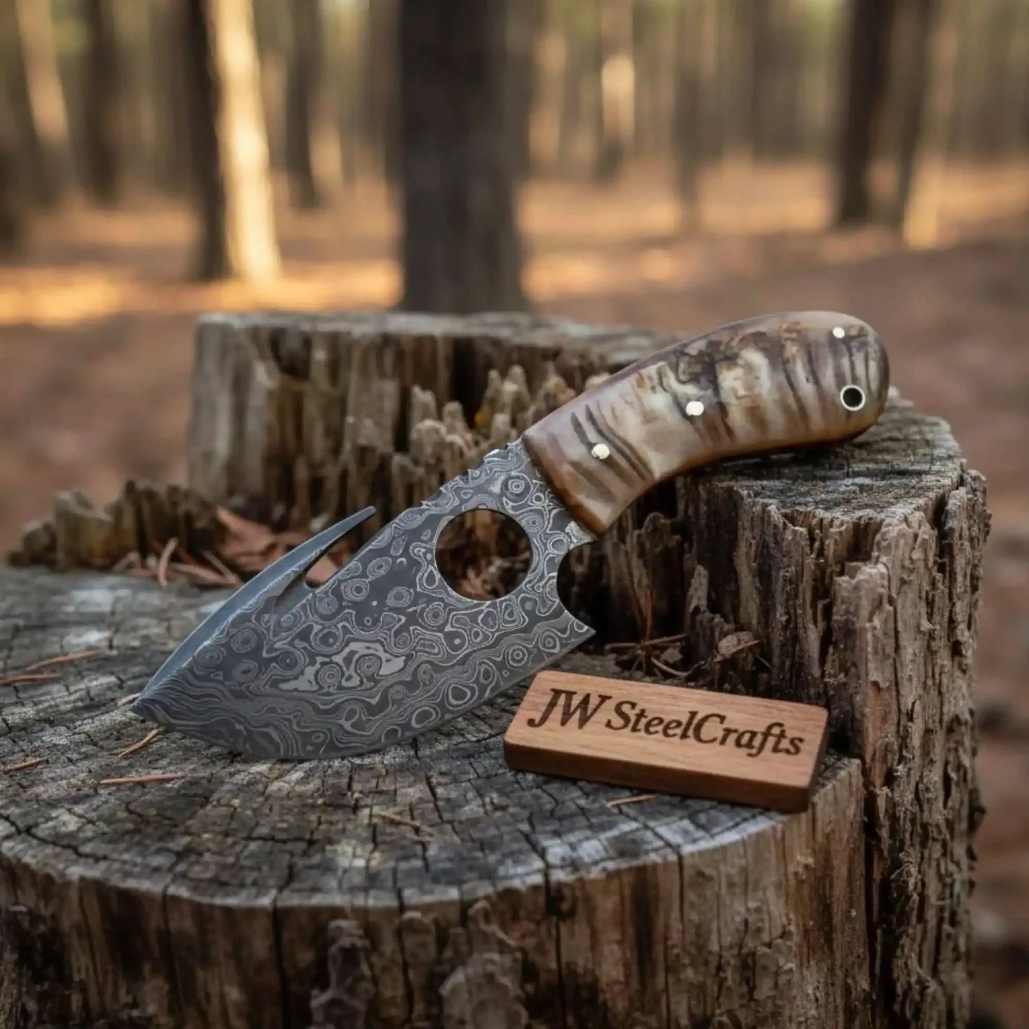 Damascus Gut hook Skinner Knife Raindrop pattern | two handle options by JW SteelCrafts, Damascus knife main product photo