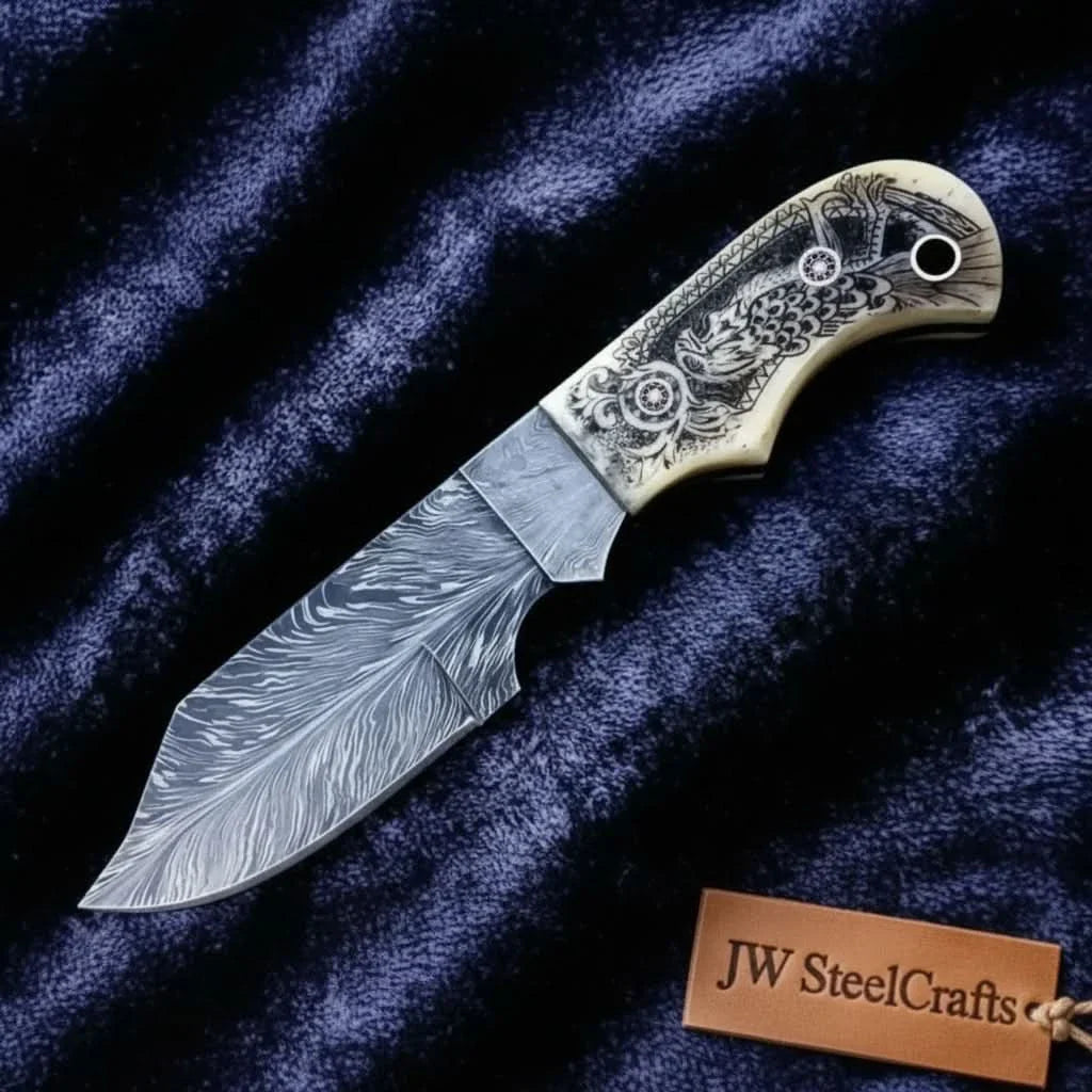 Handmade Damascus Drop Point Hunting Knife with Engraved Bone Handle and Leather Sheath by JW SteelCrafts, leather knife sheath main product photo