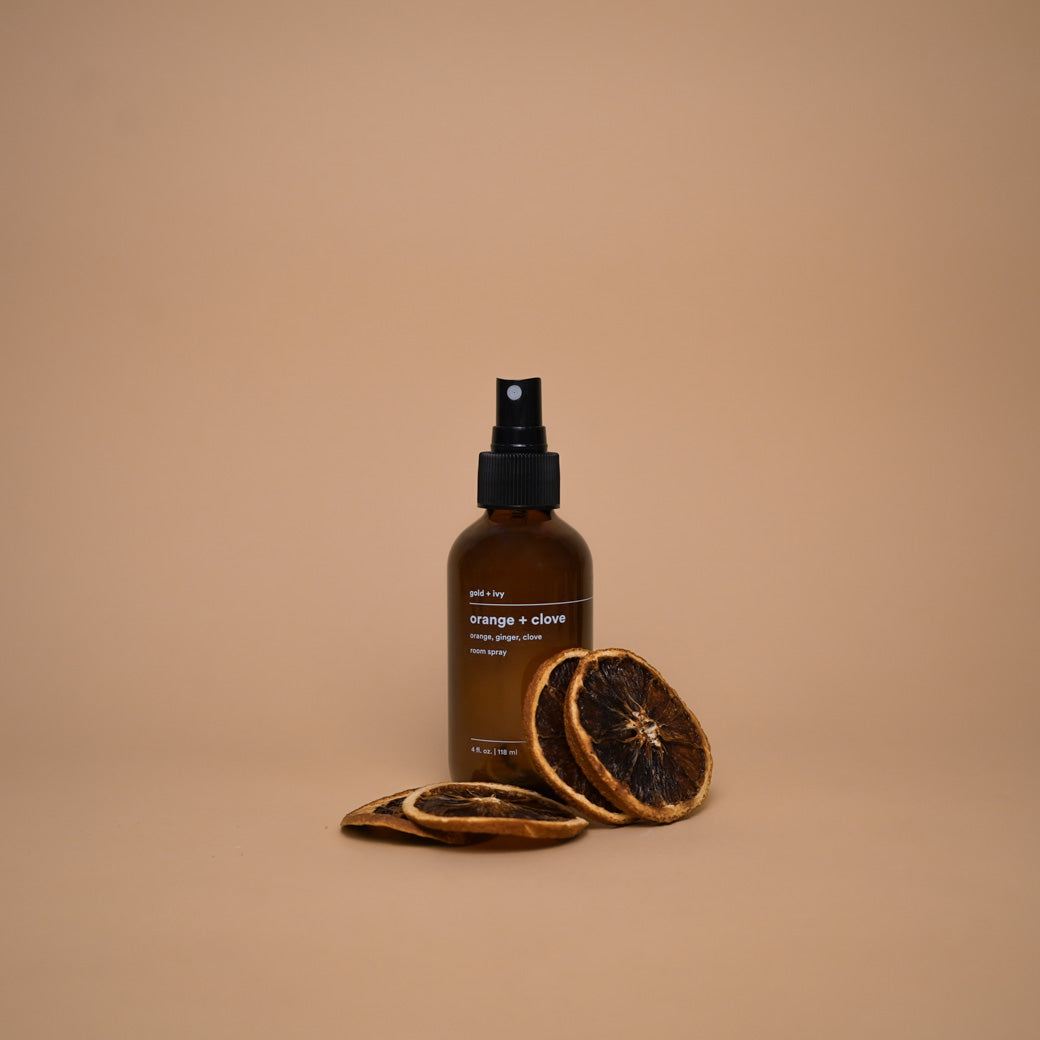 Orange + clove room spray by gold + ivy, scented candle detail photo 2