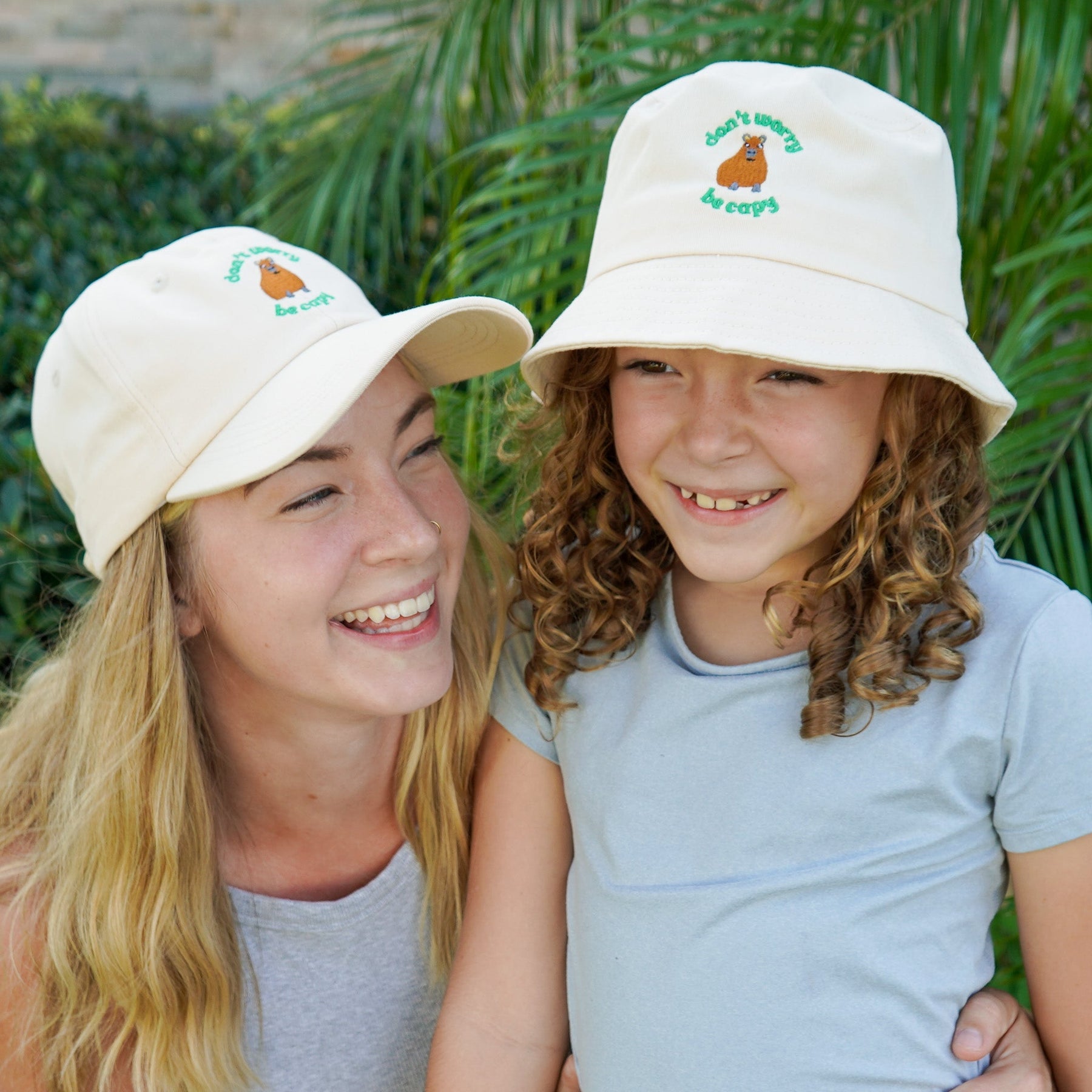 Additional view of Don't Worry, Be Capy embroidered baseball hat for kids and adults